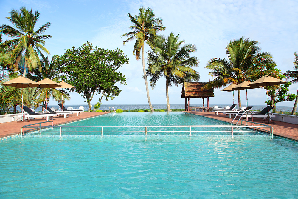 Abad Whispering Palms — lakefront pool, Kumarakom